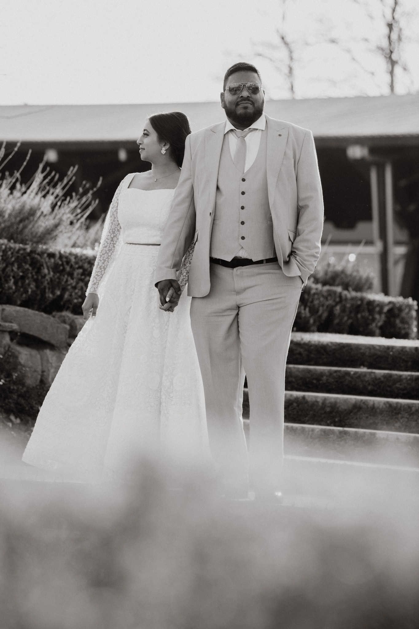  man and wife walking hand in hand 