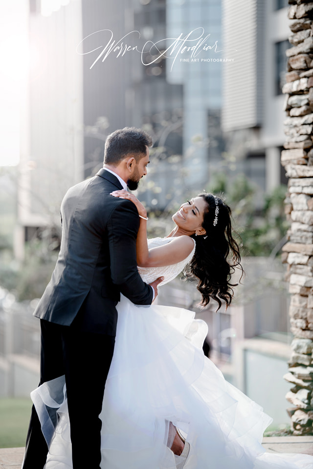  man holding wife leaning back 