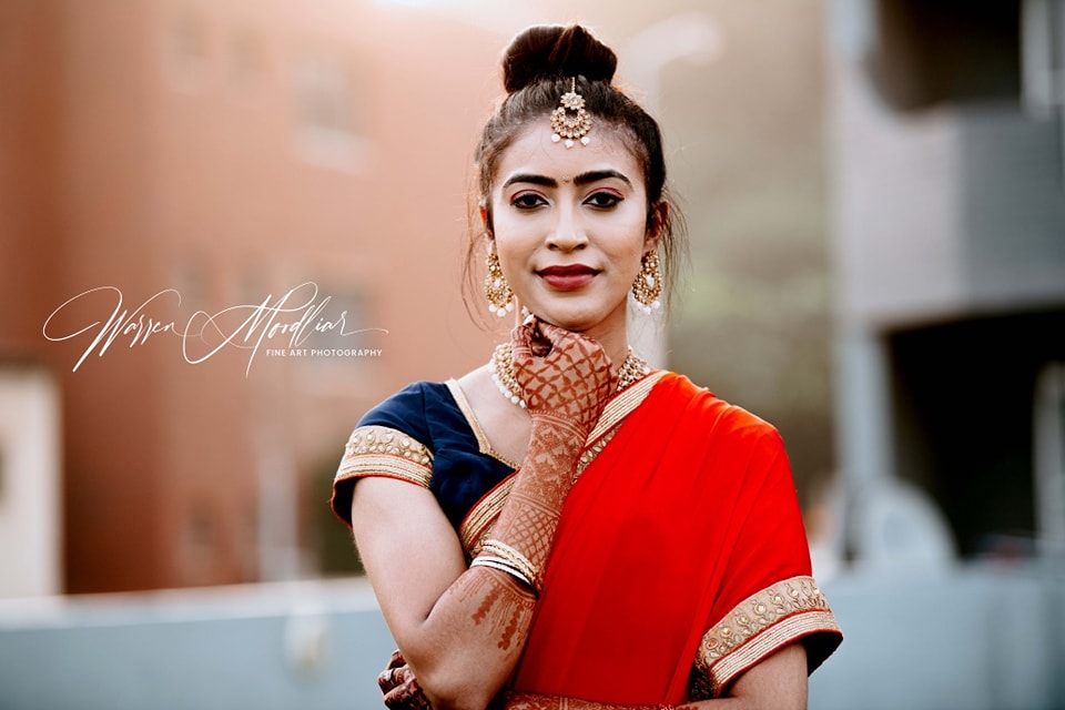  woman posing at wedding in traditional wear 